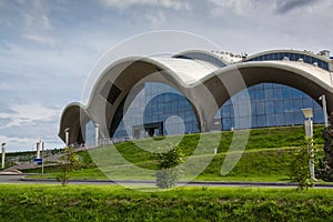 Detail of the facade of a modern building in a curved shape.