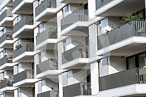 Detail of the facade of a white modern residential building