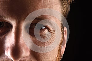 Detail of the face of a man in his early thirties