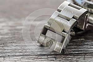 Rolex Submariner. Close-up of a iconic, swiss-made men`s divers watch, showing the clasp.