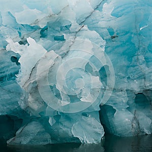 Detail of the  fantastic world of blue glacier ice -