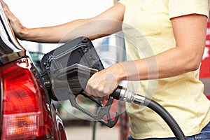 Detail Of Female Motorist Filling Car With Diesel