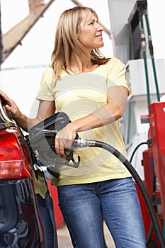 Detail Of Female Motorist Filling Car With Diesel