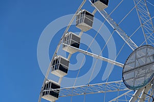 Detail of the Ferris wheel with blue sky in the background