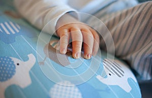 Detail of the fingers of a newborn, especially the nails. Newborn babies have long, sharp nails full of nerve endings