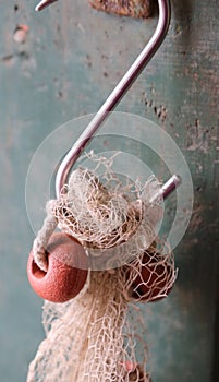 detail of a fishing boat with big hook and float