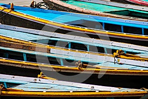 Detail of fishing boats on the banks of the Ganges in Varanasi, Uttar Pradesh