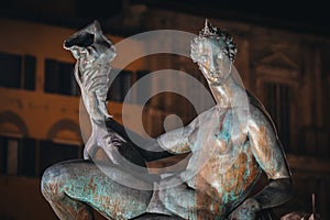 Detail from the Fountain of Neptune statue Piazza della Signoria in front of the Palazzo Vecchio Florence