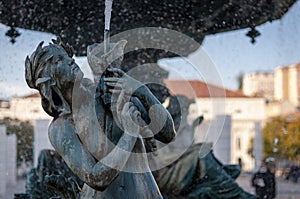 Detail of a fountain in the Rossio Square in the city of Lisbon