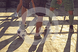 Detail of friends playing football