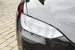 Tesla car Model S - detail of front light photo