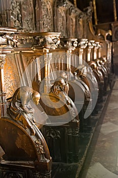 Detail of a gargoyle carved in the wood of the choir seats of Toledo Cathedral, Spain