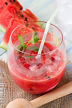 Detail of a glass full of mixed red water melon