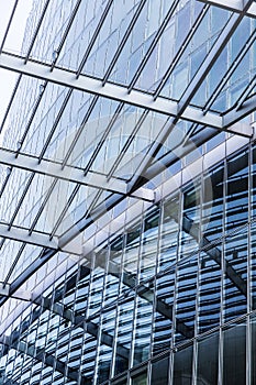 Detail of a glass roof mirroring in a modern skyscraper