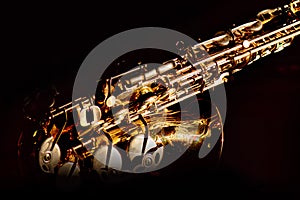 Detail of a gold colored saxophone