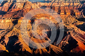 Detail of Grand Canyon rock fomation at colorful sunrise