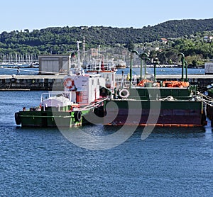 detail of green antipollution barge