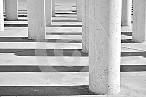 Columns and their shadows, black and white photo