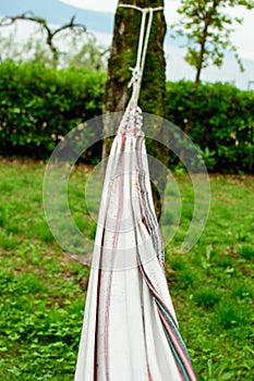 A Detail of a Hammock at the Lago di Garda in the Background