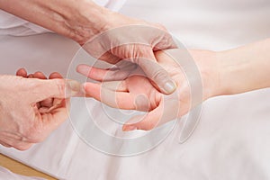 Detail hand reflexology massage