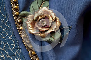 detail of a hand-sewn buttonhole on garment