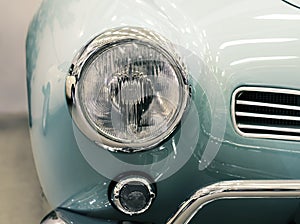 Detail on the headlight of a vintage car