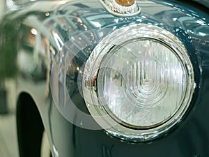 Detail on the headlight of a vintage car