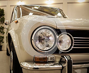 Detail on the headlight of a vintage car