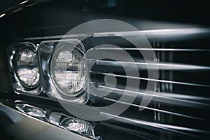 Detail on the headlight of a vintage car