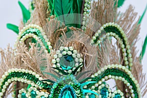 Detail of the helmet with feathers and embroidery for the carnival