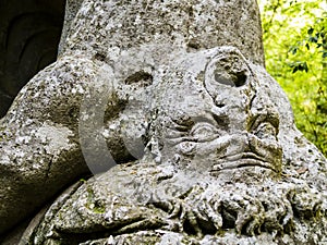 Detail of Hercules fighting Cacus, a huge sculpture at famous Park of the Monsters, also named Sacred Grove, Bomarzo Gardens, prov