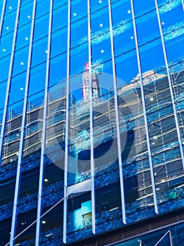 Construction Site Reflections in Glass Facade