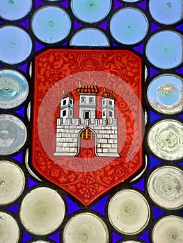 Detail of historic window glass with coat of arms of Bratislava city