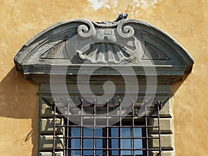 Detail of historic window in Pisa. Italy.