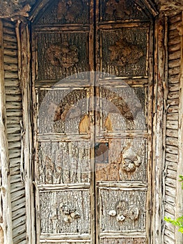 A detail from an historic wooden door.