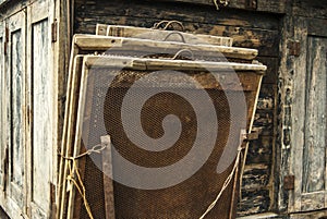 Detail of a historical sheep carriage with different sieves