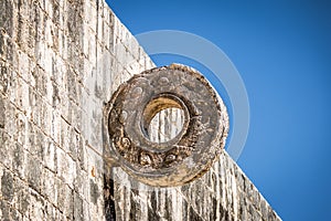 Detail of hoop at ball game court juego de pelota at Chichen Itza, Mexico photo