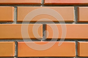Detail of the house wall. Background of facing bricks