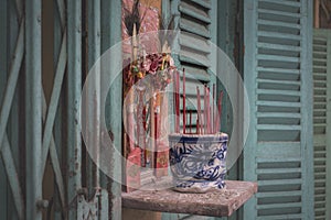 Detail of a houseâ€™s facade at Hao Si Phuong old traditional alley in Ho Chi Minh City, Vietnam