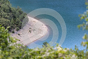 Detail of huge reservoir in the Spanish Pyrenees, on the border of Catalonia and Aragon. Panta d Escalas Swamp of Stairs