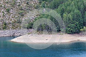 Detail of huge reservoir in the Spanish Pyrenees, on the border of Catalonia and Aragon. Panta d Escalas Swamp of Stairs