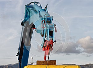 detail of hydraulic crane on a fishing vessel