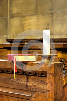 Detail of hymnal and candle