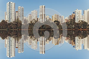 Detail of the IgapÃÂ³ lake in the city of Londrina, southern Brazil, with buildings in the background. photo