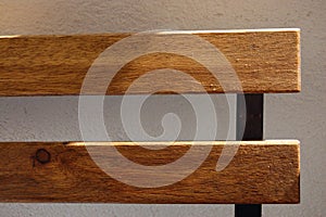 Detail of iluminated wooden bench photo