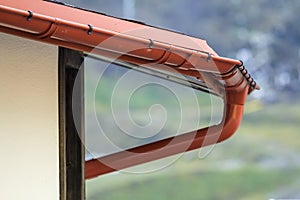 Detail image of new roof with gutter rain system