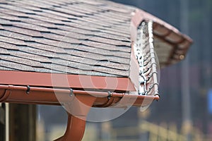 Detail image of new roof with gutter rain system