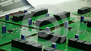 Detail of integrated circuit board with chip. Integrated circuit board of a hard disk. Chip, microchip