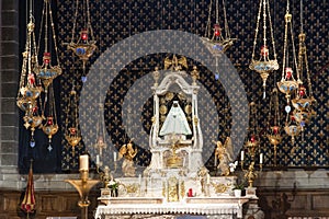 Detail of the interior of a church in puy in velay with a black virgin