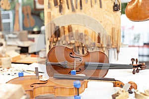 Detail of the interior of a handmade violin making workshop. Traditional handcrafting of musical instruments